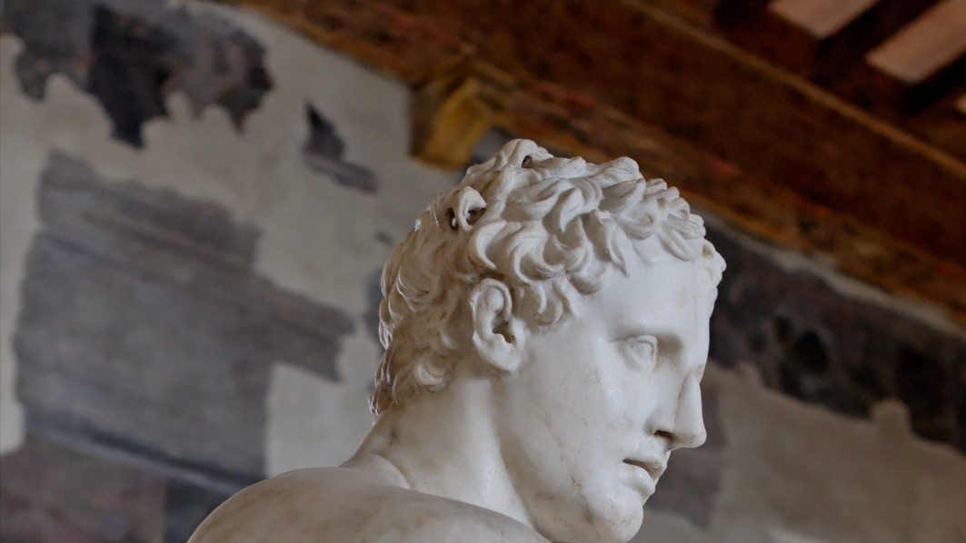 The Ludovisi Ares, a 2nd-century AD Roman marble copy of a late 4th-century BC Greek original, showing the god seated on a trophy of arms with an Eros figure at his feet. On display at Palazzo Altemps, Rome.