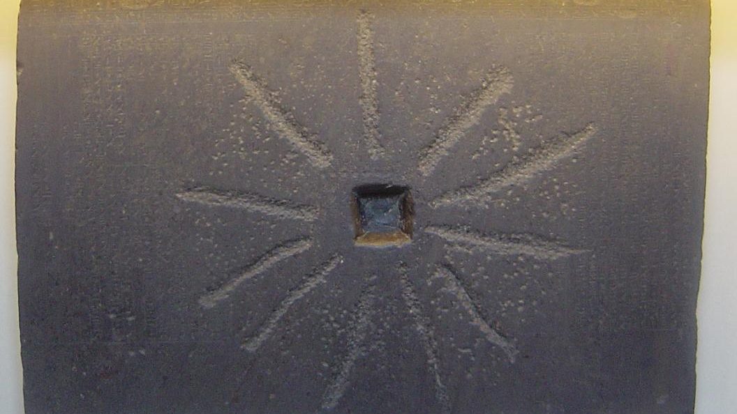The Shabaka Stone, a black granite slab inscribed with the Memphite Theology, commissioned by King Shabaka of Egypt's Twenty-fifth Dynasty and now held in the British Museum.