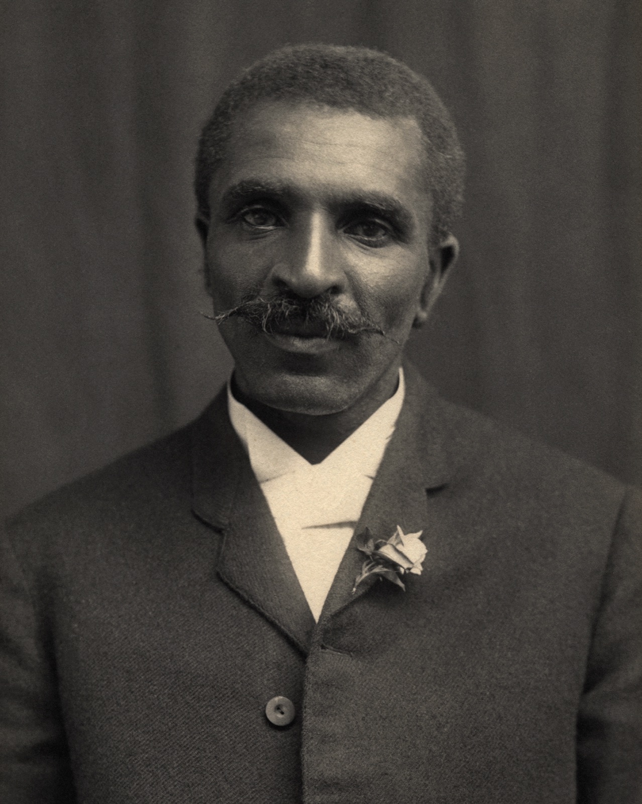 Formal portrait photograph of George Washington Carver, circa 1910
