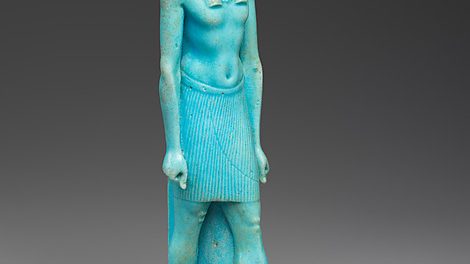 A blue-green faience statuette of the Egyptian god Thoth, shown as a man with an ibis head striding forward in the standard ancient Egyptian pose, from the Ptolemaic Period.